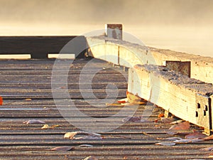 Dock on misty foggy lake