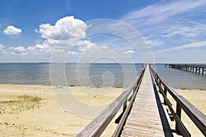 Dock, ocean, and clouds