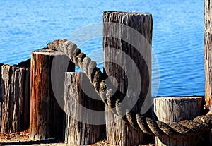 Dock Pilings with Rope photo