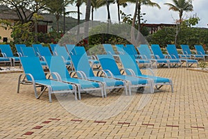 docked behind empty lounge chairs awaiting passengers at Amber Cover, the cruise lines privately owned port