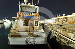 Docked boat at night