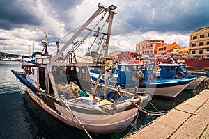Docked fishing boat at the marina in Sardigna