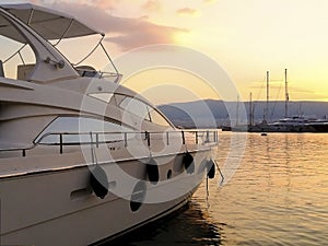 Docked luxury yacht at sunset in marina Zeas, Piraeus, Greece