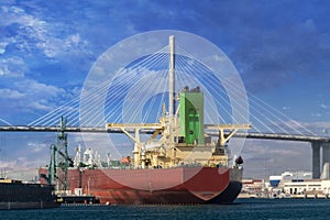 Docked ship with the Long Beach International Gateway Bridge in the background