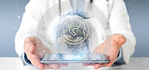Docotor holding a World globe surronding by ecology icons and connection 3d rendering photo