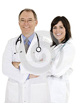 Group of confident Caucasian doctors and nurses with their arms crossed displaying some attitude