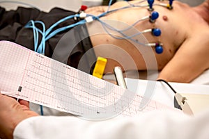 Doctor is analyzing patient`s cardiogram test. Diagnostic, healthcare, medical service