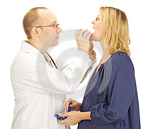 Doctor apply patient a mouthguard photo