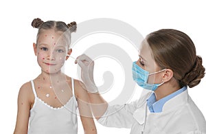 Doctor applying cream onto skin of girl with chickenpox against white background. Varicella zoster virus