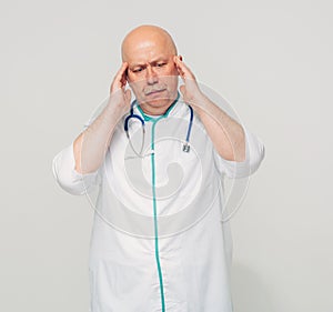 A doctor banging his head realizing a mistake