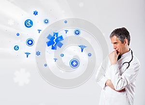 Doctor with blue medical icons