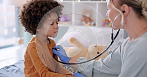 Doctor, boy and stethoscope with breathing in hospital for examination, cardiology or consultation for health support