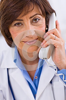Doctor calling on phone
