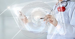 Doctor checking brain testing result with computer interface