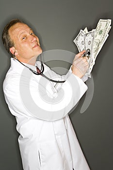 Doctor checking finances