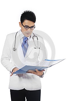 Doctor checking the medical record