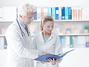 Doctor checking medical records