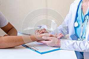 Doctor checking patient pulse. Measuring heartbeats. Health check. Appointment with specialist