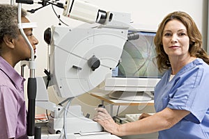 Doctor Checking Patient's Eyes For Glaucoma photo