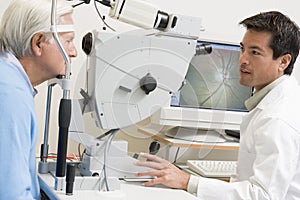 Doctor Checking Patient's Eyes For Glaucoma photo