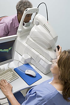 Doctor Checking Patient's Eyes For Glaucoma photo