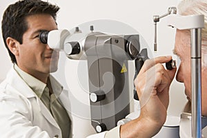 Doctor Checking Patient's Eyes For Glaucoma photo