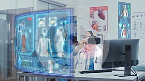 Doctor checks body scans using vr