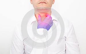 The doctor checks during the examination of the thyroid gland in a man on a white background. Concept of Thyroid Disease in Men,