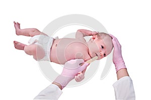 Doctor checks the throat of a newborn child with a plowshare, isolated