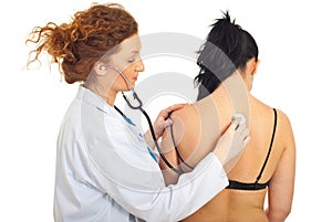 Doctor checkup back woman
