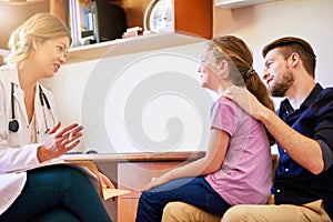 Doctor, child and father in consultation for healthcare with paperwork, medical history and health support. Pediatrician