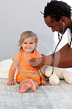 Doctor with a child in a hospital