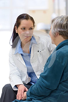 Doctor comforting patient