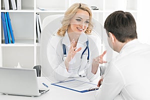 Doctor consulting patient