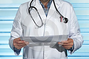 Doctor consulting patient medical reports