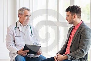 Doctor consults young patient