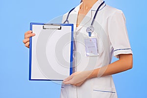 Doctor with copyspaced clipboard