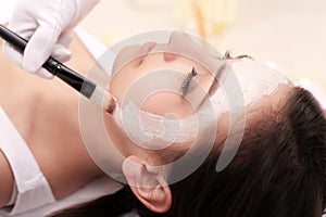 The doctor is a cosmetologist for the procedure of cleansing and