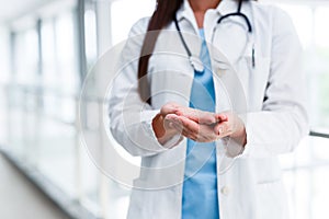 Doctor with crossed empty palms