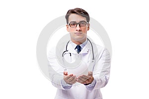 The doctor with crystal ball isolated on white background