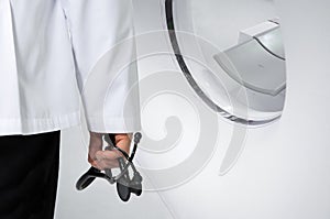 A doctor and a CT scanner