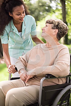 Doctor and disabled woman