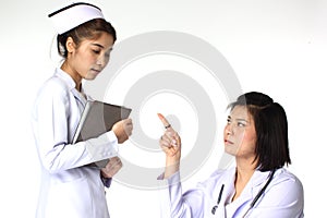 Doctor discussing prognosis with nurse