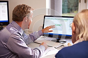 Doctor Discussing Test Results With Senior Male Patient