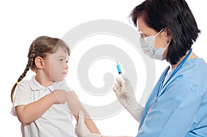 Doctor does an inoculation to girl