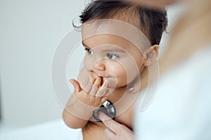 Doctor always does a thorough physical checkup. Closeup shot of a paediatrician using a stethoscope during a babys