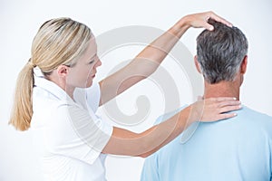 Doctor doing a neck adjustment