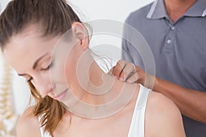 Doctor doing neck adjustment