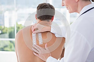 Doctor doing skin test to her patient