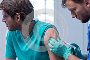 Doctor doing tetanus toxoid injection